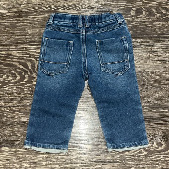 Oshkosh blue jeans with a cuffed hem with functional button and zipper - Picture 2 of 5